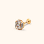 Gold-toned flat-back stud with a round clear center stone framed by four rectangular clear stones, shown at an angle.