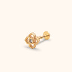 Gold-toned stud earring with four angular open petals, a clear round center detail, and a straight post with a flat disc back.