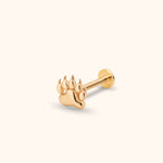 Gold-toned paw-shaped stud with pointed claw details, a straight post and flat round back, shown at an angle on a cream background.