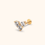 Gold-toned piercing stud with three clear faceted stones in a triangular cluster, a straight post and a flat round back.