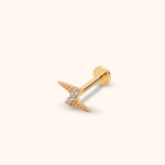 Gold-tone lightning bolt stud with ridged details, two round clear stones, a straight post and a flat circular back.