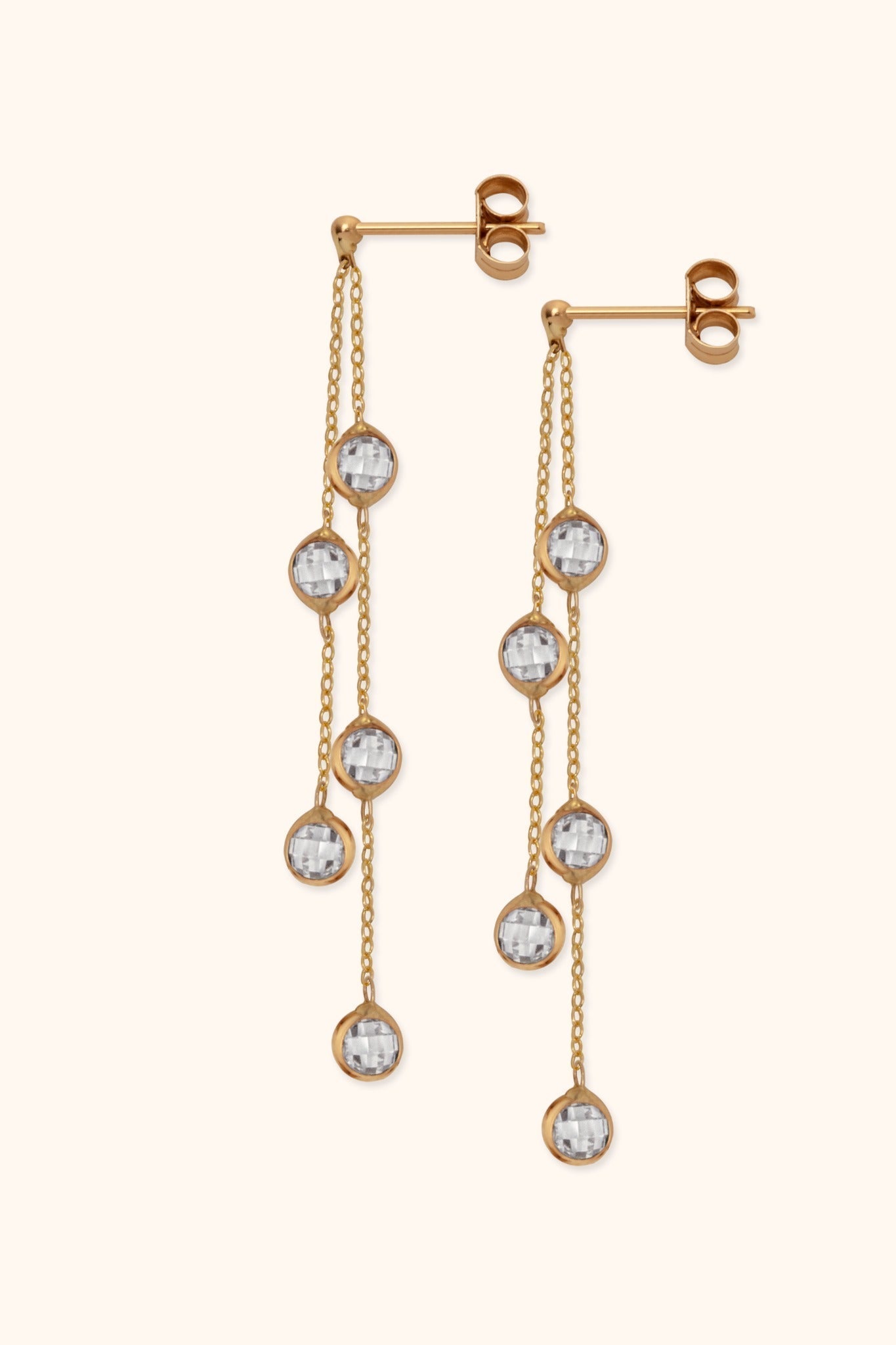 Pair of gold-tone drop earrings, each with two fine chains, five round clear faceted charms, and butterfly backs.