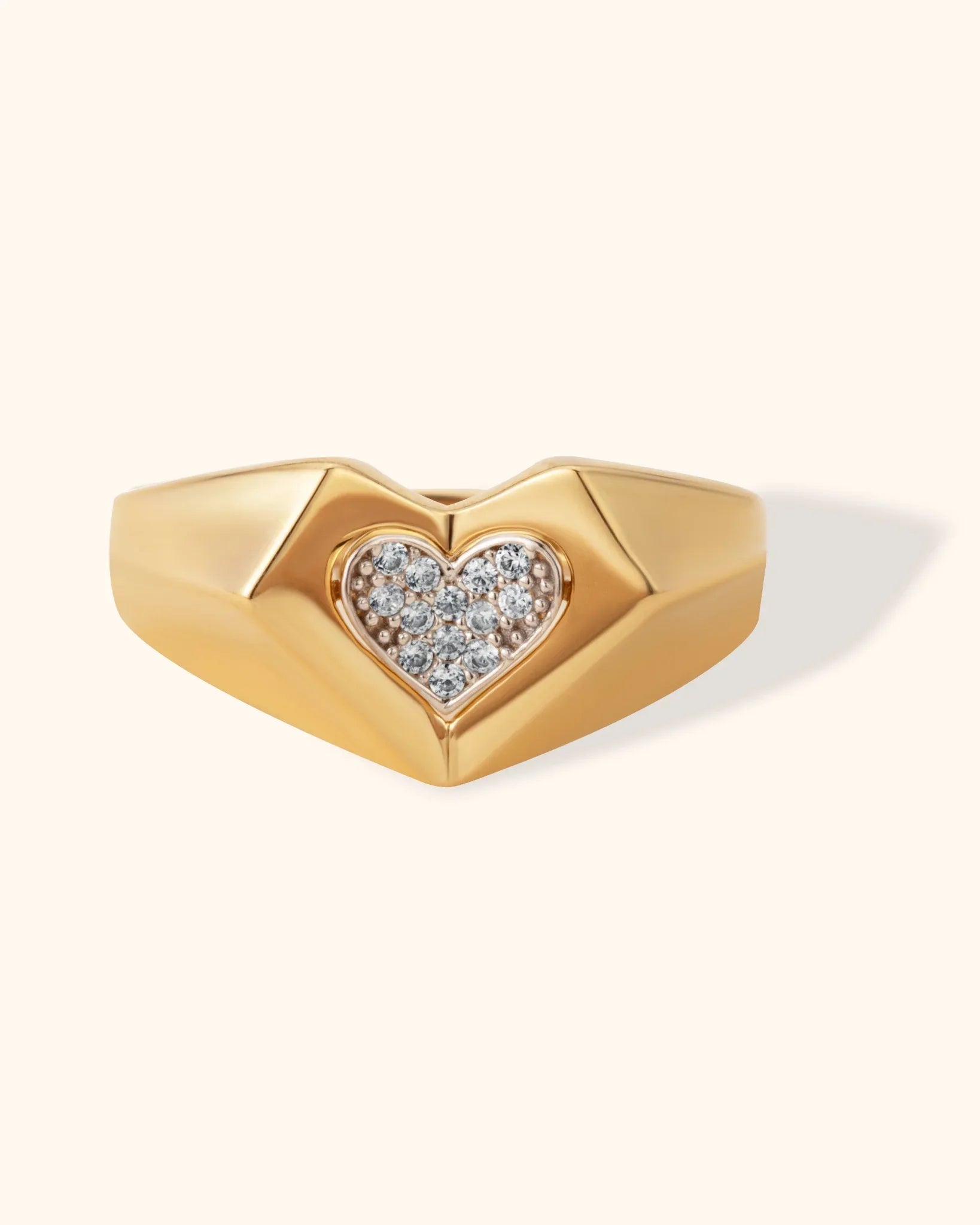 14K gold geometric heart ring with pavé-set diamonds in center, bold signet style