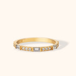 14K solid gold ring featuring alternating baguette and round diamonds in a sleek gold band, elegant stacking ring for everyday or formal wear