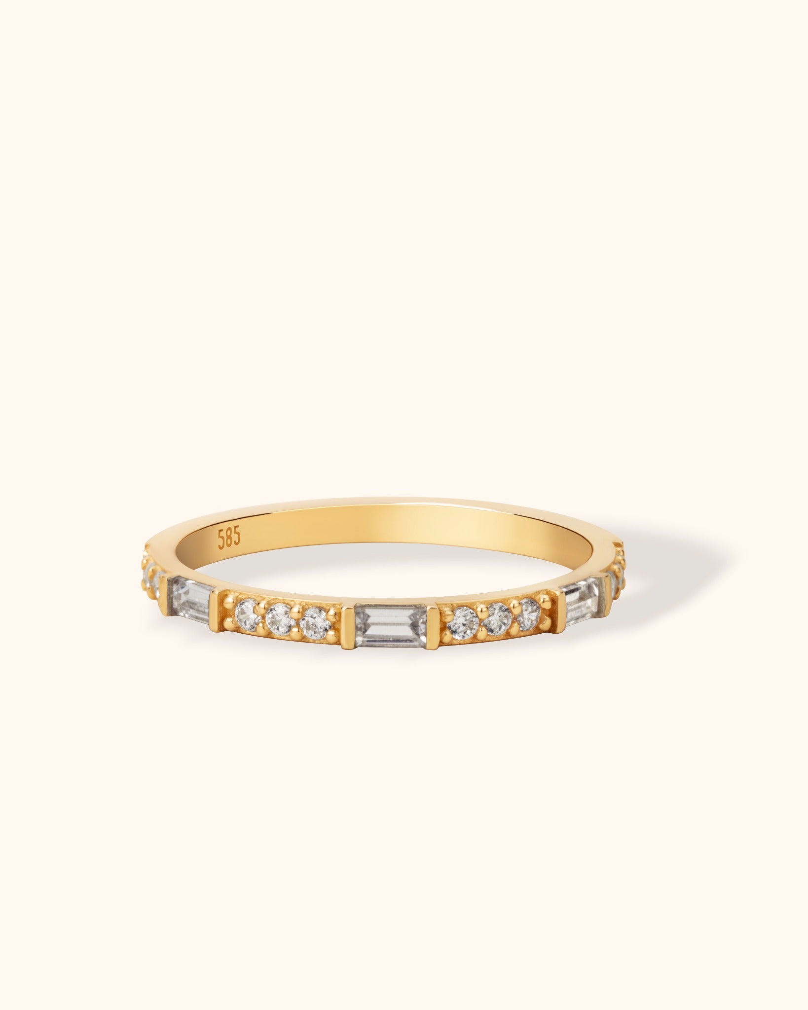 14K solid gold ring featuring alternating baguette and round diamonds in a sleek gold band, elegant stacking ring for everyday or formal wear