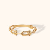 Minimalist 14K yellow gold ring featuring polished link chain design with modern round accents