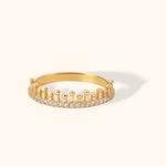 14K gold crown-shaped ring with round diamond accents in pavé setting