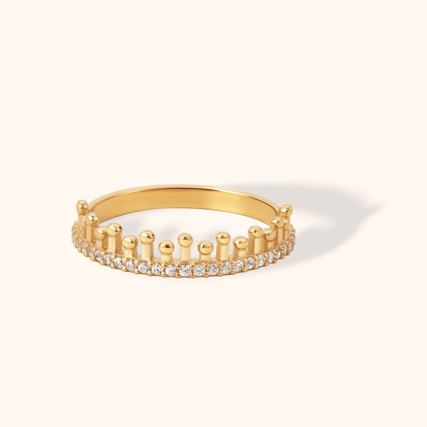 14K gold crown-shaped ring with round diamond accents in pavé setting