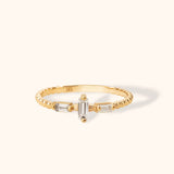 14K gold ring with beaded band and three vertical-set baguette-cut white stones