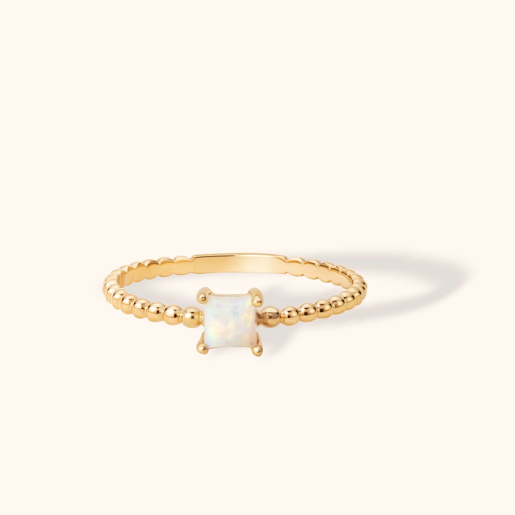 14K gold beaded ring with square-cut opal center stone, minimal and celestial-inspired design