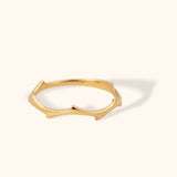 14K gold minimalist ring with geometric crown-like peak design, modern stacking band