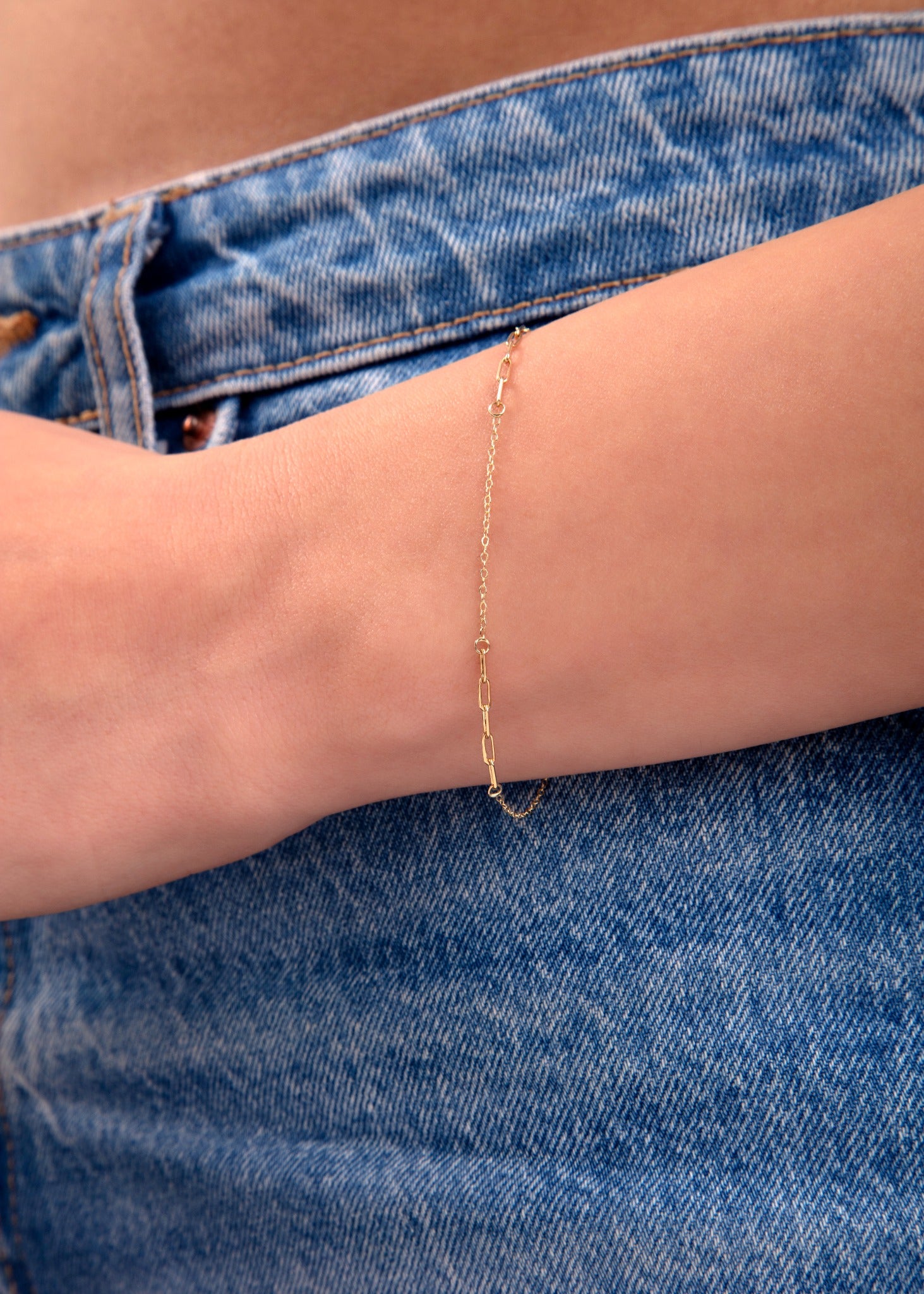 Wear it with the matching Paperclip Necklace and Mini Gold Hoops for a cohesive golden look that works from day to night.

