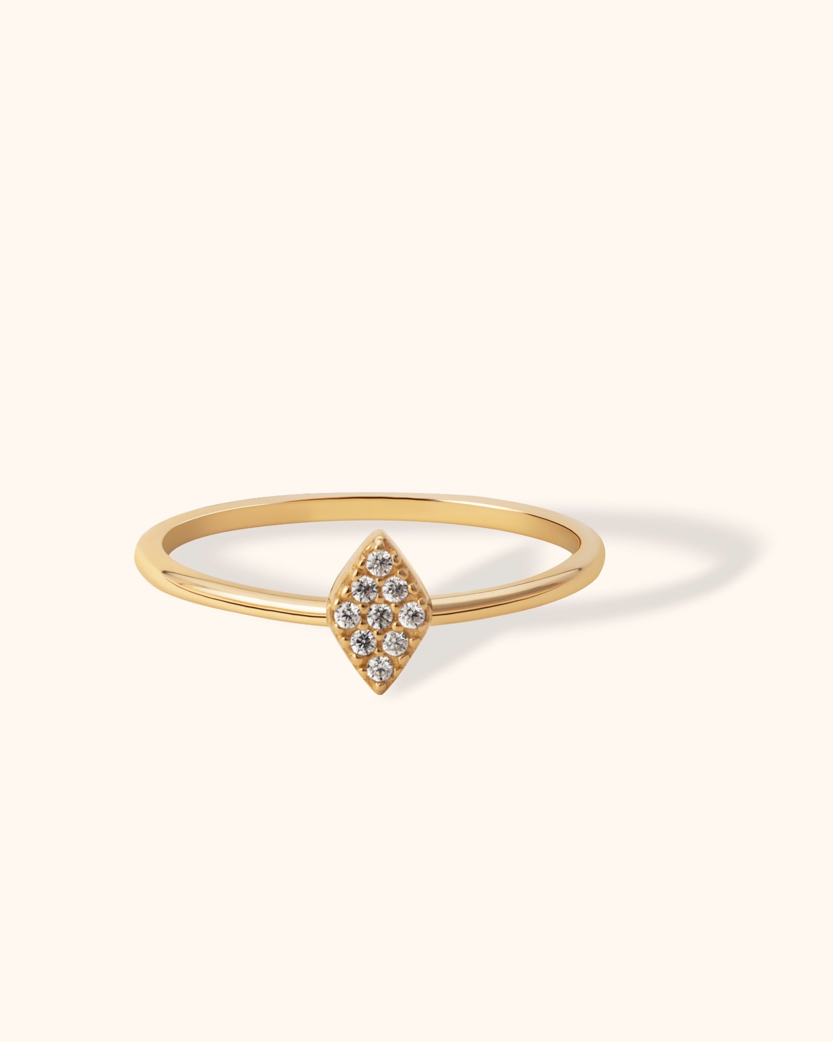 Minimal 14K gold ring with diamond-studded rhombus centerpiece