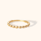 14K gold minimalist stacking ring with bead-like design, delicate and elegant