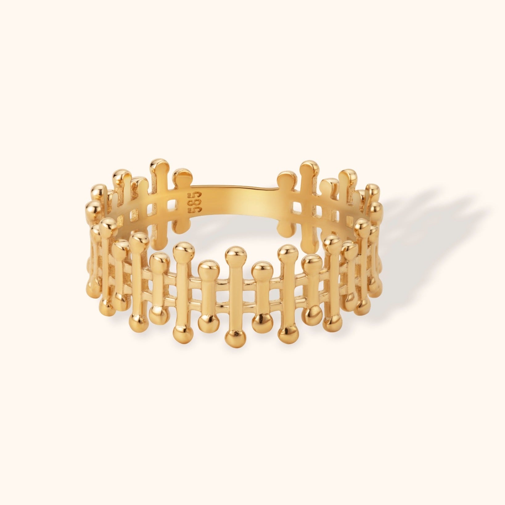 Bold architectural crown ring in 14K gold with structured geometric grid design, crown design