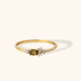 Delicate 14K gold ring with oval yellow sapphire and round diamonds"