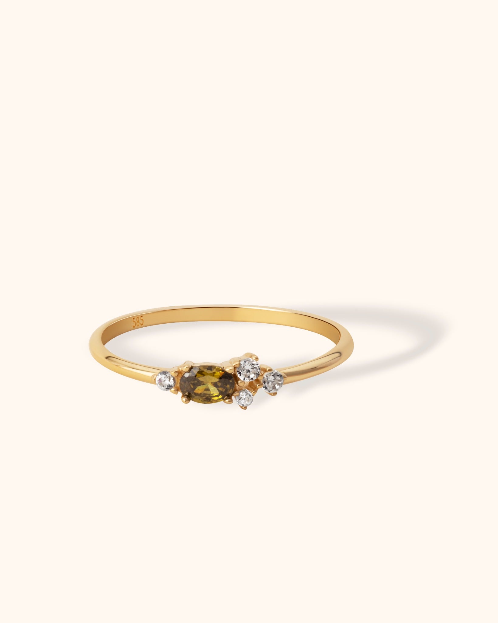 Delicate 14K gold ring with oval yellow sapphire and round diamonds"