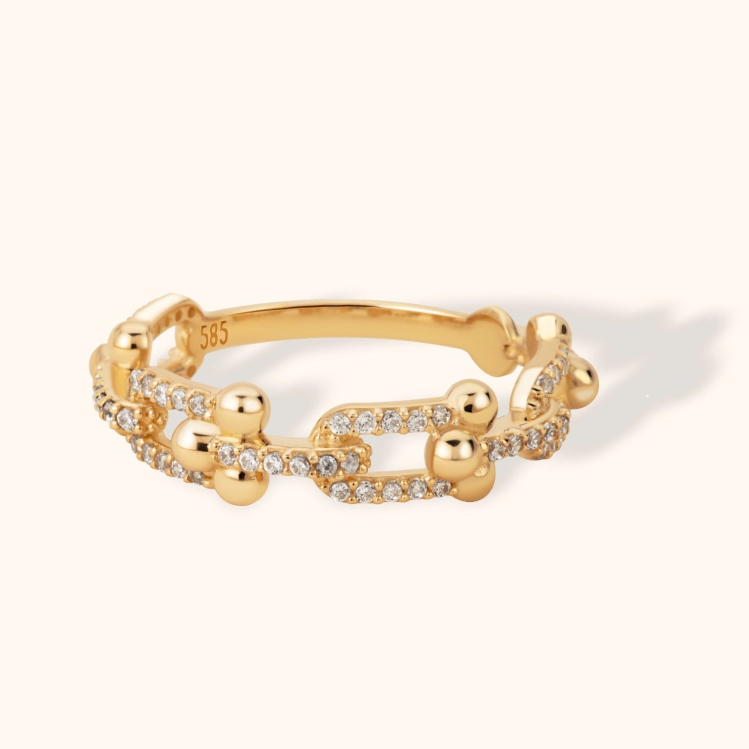 14K gold ring with diamond pavé chain link design, bold structured band with polished gold spheres and sparkle accents