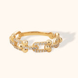 14K gold ring with diamond pavé chain link design, bold structured band with polished gold spheres and sparkle accents