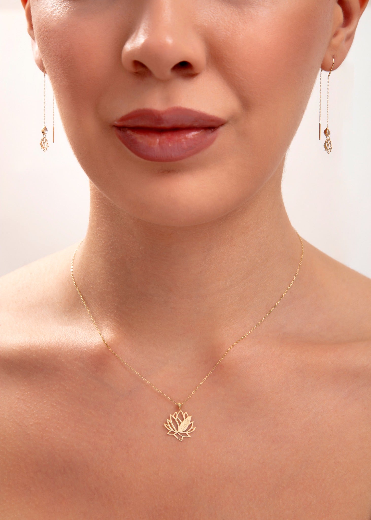 Model wearing a 14K gold plated lotus flower necklace with matching lotus threader earrings, spiritual minimalist jewelry set

