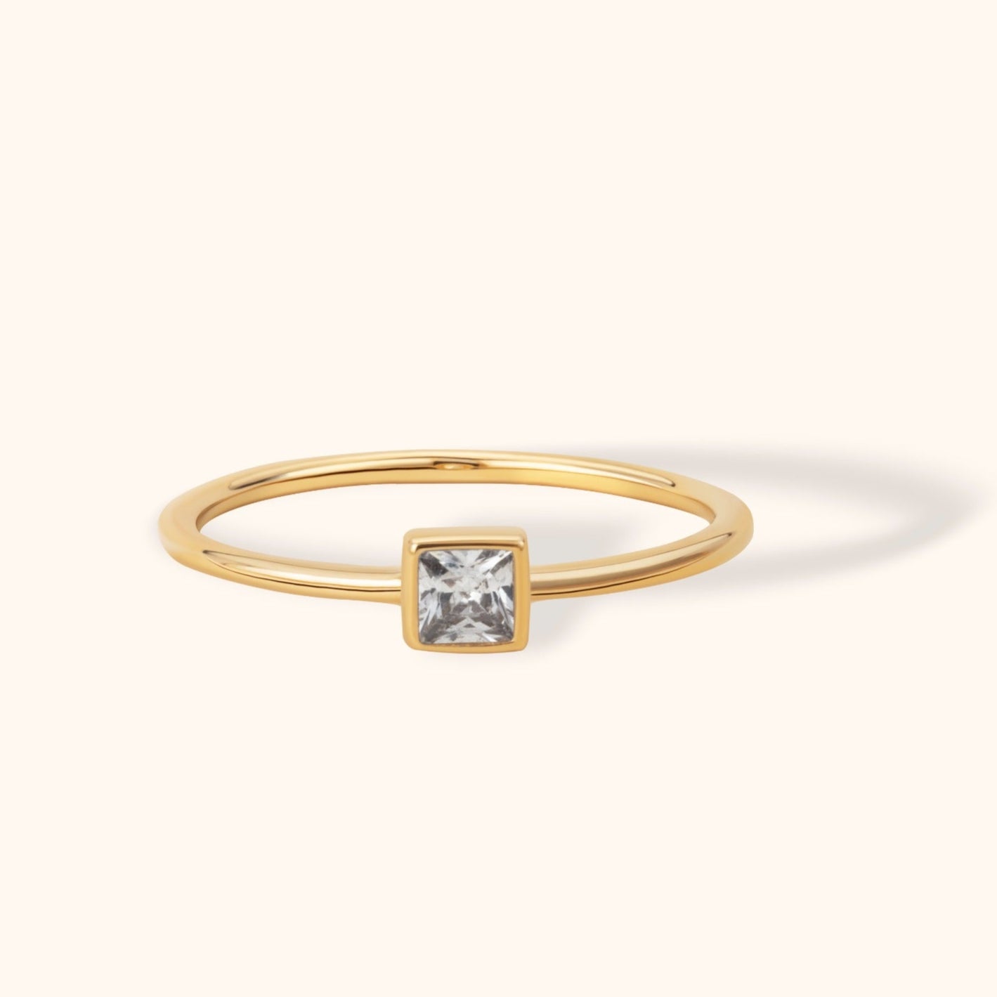 14K gold ring with bezel-set square princess cut diamond