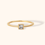 14K gold ring with bezel-set square princess cut diamond