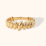 Polished 14K gold marquise-shaped link ring with modern fluid design