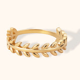 14K gold ring featuring an elegant laurel leaf wreath design