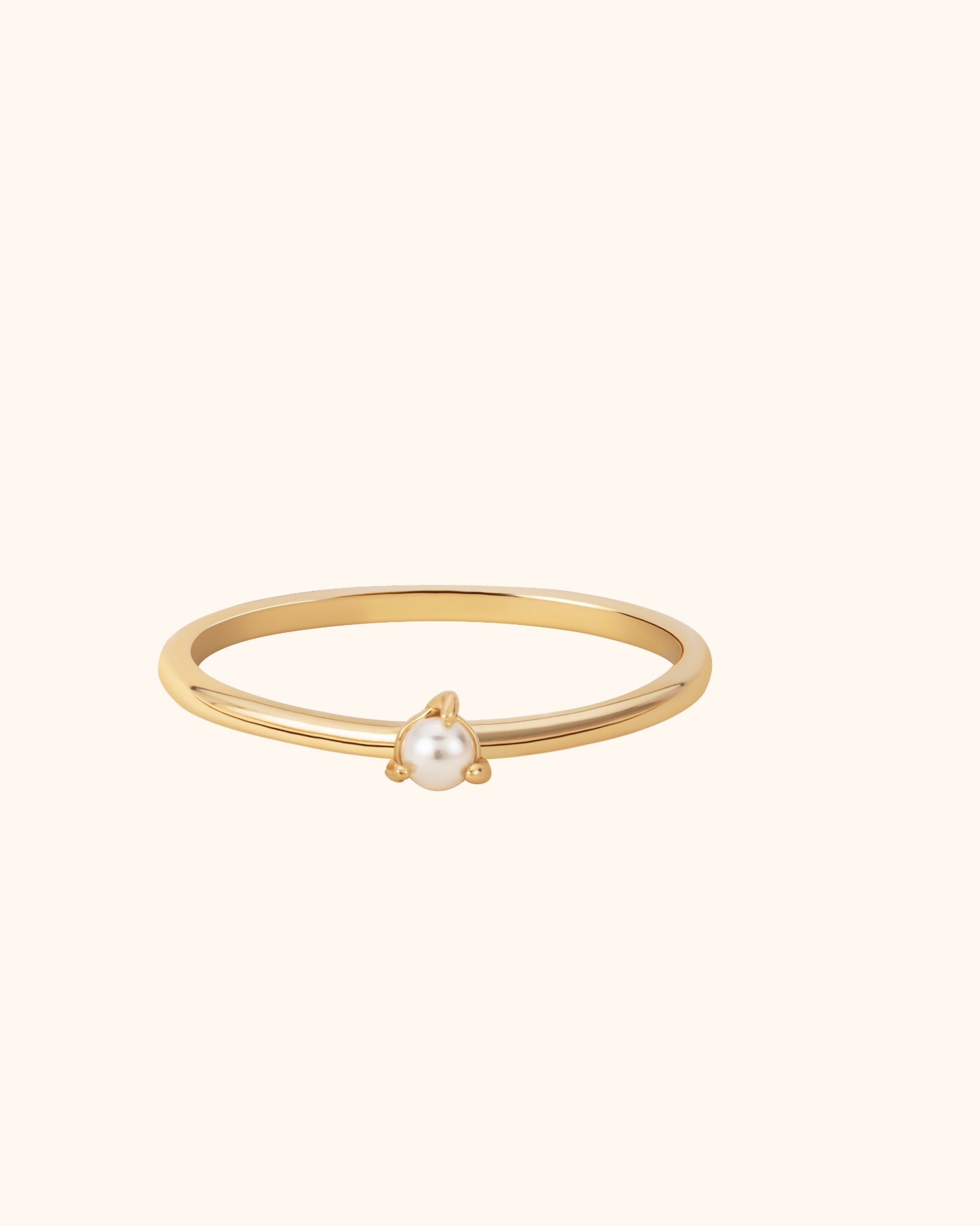 Delicate 14K gold ring with a single freshwater pearl