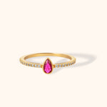 14K gold ring with pink teardrop gemstone and pavé-set band, elegant and colorful fine jewelry