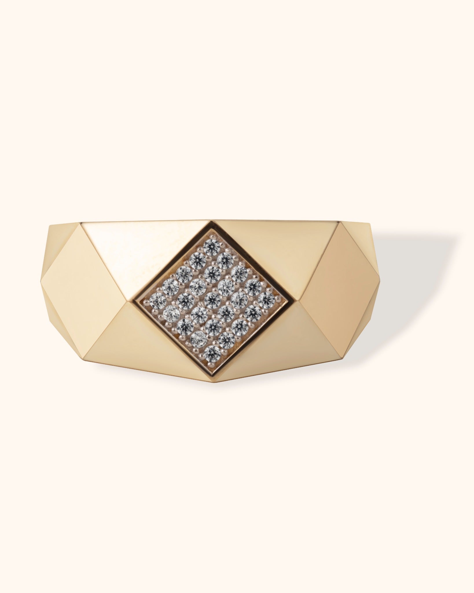 Bold faceted 14K gold ring with geometric diamond grid centerpiece