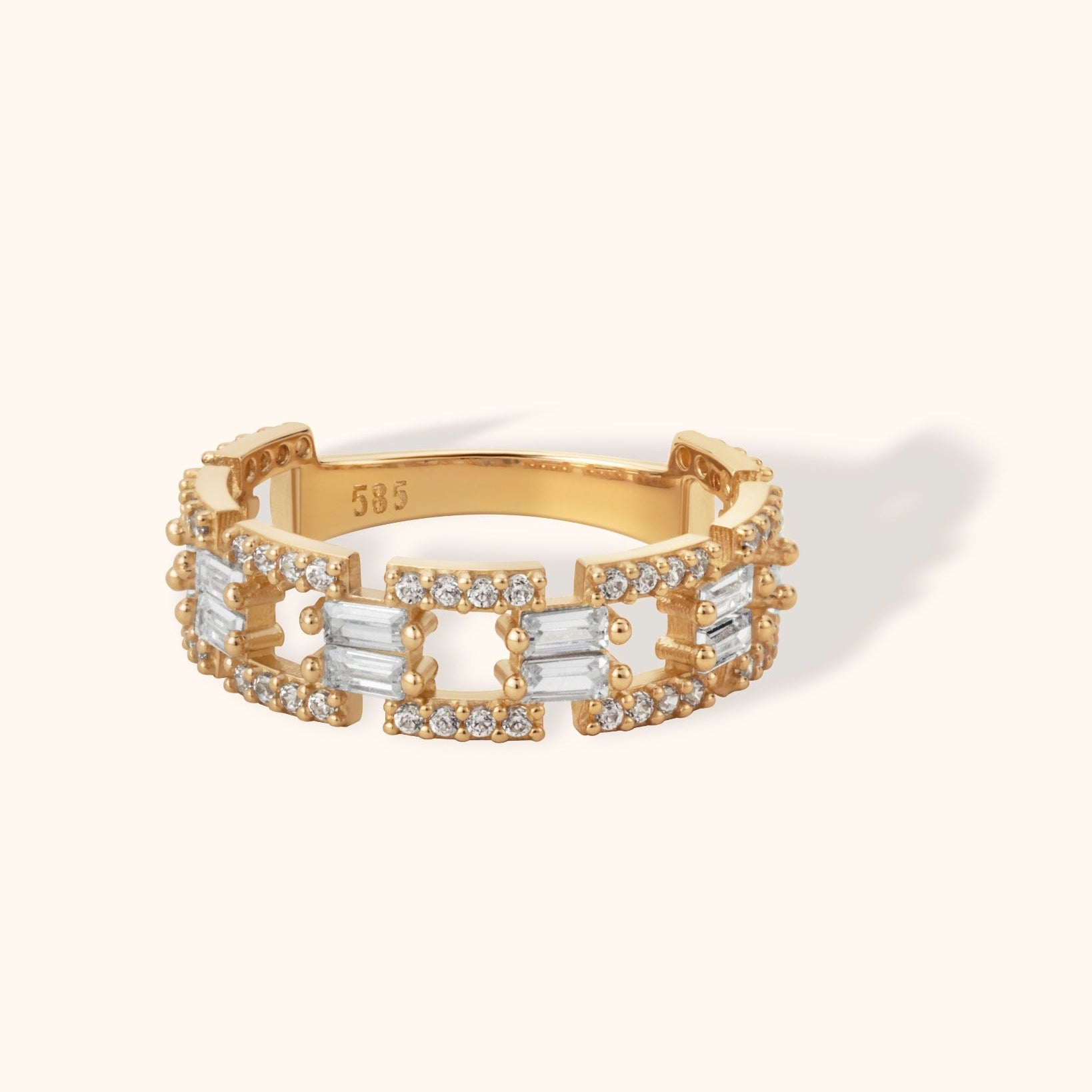 14K gold wide ring with baguette and pave diamonds in grid pattern