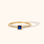 14K gold ring with square-cut royal blue sapphire and pavé white zirconia accents
