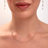 Tricolor mirror bead necklace and earrings on model, mixed metal reflective beads in gold, silver, and rose tones

