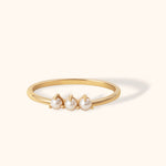 14K gold ring with three drop-shaped white pearls in a minimalist design