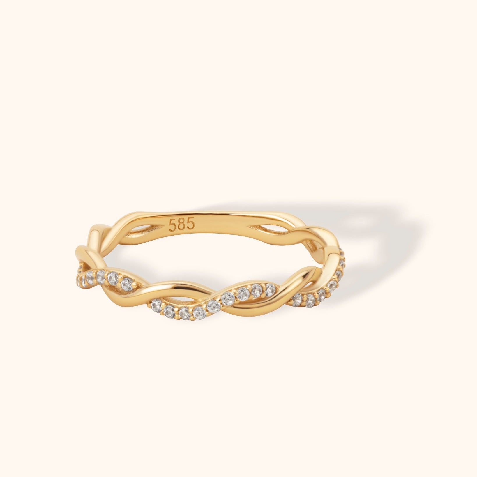 14K gold twisted ring with infinity design and diamond accents