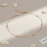 Pulseira Minimalista de Contas Dorika em Ouro 14K – Joalharia Elegante para o Dia a Dia