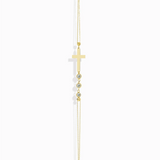 14K gold bracelet with minimalist cross and three small crystal beads, displayed white