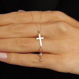 Minimal 14K gold cross necklace with crystal drop
