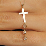 Minimal 14K gold cross necklace with crystal drop