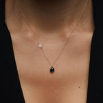 Elegant 14K gold necklace with black onyx teardrop pendant