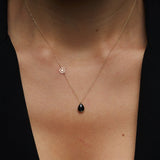 Elegant 14K gold necklace with black onyx teardrop pendant