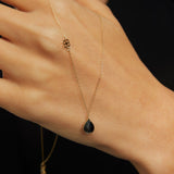 Elegant 14K gold necklace with black onyx teardrop pendant