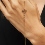 14K gold bracelet with geometric diamond outline and faceted gemstone bead accents