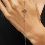 14K gold bracelet with geometric diamond outline and faceted gemstone bead accents