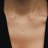 Real 14K gold rose-shaped flower pendant necklace symbolizing elegance and love.