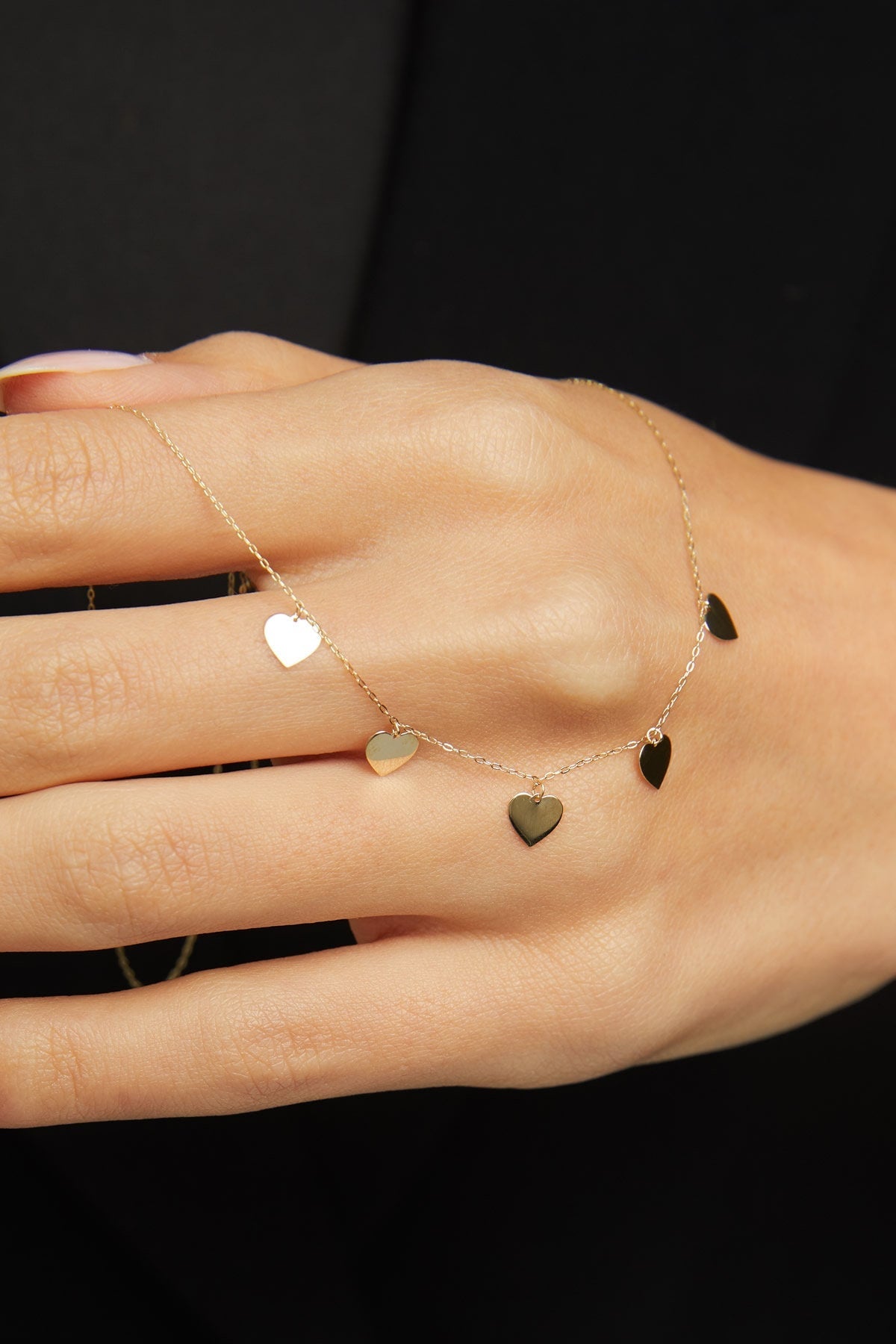 Multiple heart charm necklace in 14K gold