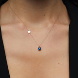 14K gold necklace with teardrop blue sapphire and round gold initial disc charm