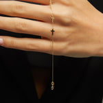 14K gold bracelet featuring five minimalist cross charms