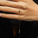 14K gold bracelet featuring five minimalist cross charms